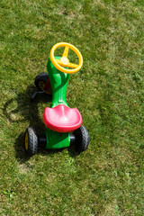 vintage bobby car in meadow play toy kids