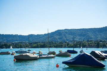 Fototapeta na wymiar boat on lake zurich in summer