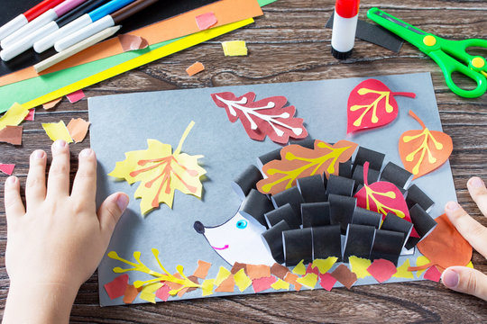 Autumnal application of a hedgehog and deciduous leaves. Children's Art Project, needlework, crafts for kids.