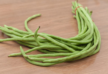 Yard long Bean on wooden table