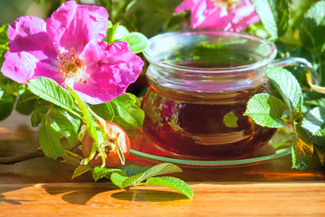 Obraz na płótnie Canvas Healthy tea of dogrose berries. Herbal medicine.