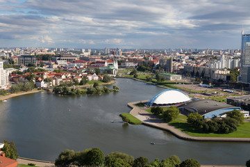 Naklejka premium Aerial view of the south part of the Minsk with Trinity Hill, Liberty Square, Palace of Sport and Svislach River. Minsk is the capital and largest city of Belarus.