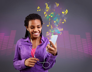 girl with headphones listening to music on smartphone.