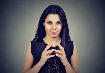 Sly, scheming woman plotting something