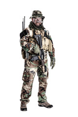 Special forces United States in Camouflage Uniforms studio shot. Holding weapons, wearing jungle hat, Shemagh scarf, painted face, his outfit clothes designed for jungle warfare. Studio shot isolated