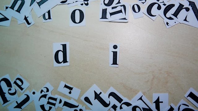 Printed On Paper Letters Make up the Word Do It On Table. Paper Scraps Word Do It. Motivation Concept For Business, For Self Belief, Positive Attitude, Motivation