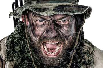United States Commando face studio shot. Mouth opened, soldier yelling, emitting intimidate...
