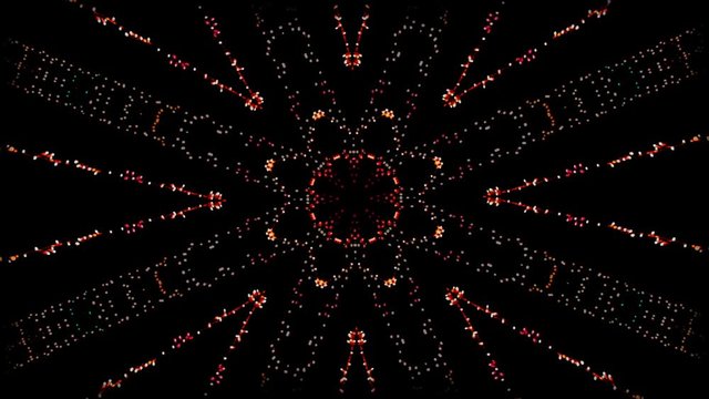 Fractal caleidoscopico abstracto de formas geometricas y luces de multiples colores 
