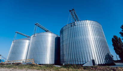 Modern silos for storing grain harvest. Agriculture.