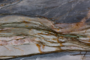 Surface of the marble with brown tint.