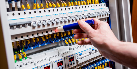 Checking voltage in switchboard with a detector