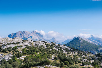 Fototapeta na wymiar mediterranean mountains against blue sky