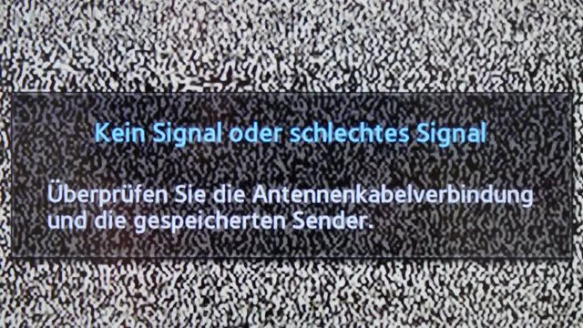 White noise signal on TV. No channel white noise signal close-up . German.