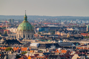 Fototapeta na wymiar Skyline of Copenhagen with a cupola of Frederik's Church, Denmark