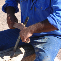 Flinders Rangers National Park, Australia - February 09, 2002: Building a boomerang