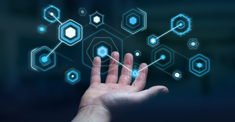 Businessman using digital screens with holograms datas 3D rendering