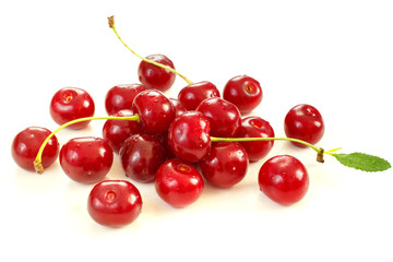 Obraz na płótnie Canvas Red fresh cherry heap on white background