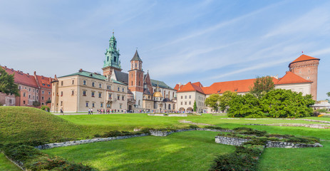 Fototapeta na wymiar KRAKOW, POLAND - SEPTEMBER 3, 2016: Tourists visit Wawel castle in Krakow, Poland