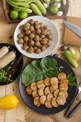 Steamed pork sausage in a white plate served with Thai traditional style chili sauce