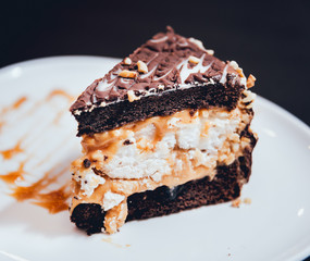 Dessert with cream on the wihte plate