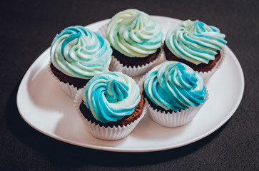 Chocolate caramel cupcake with nuts and butterscotch syrup