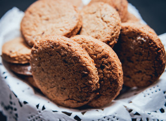 French cookies with jam on the white plate.
