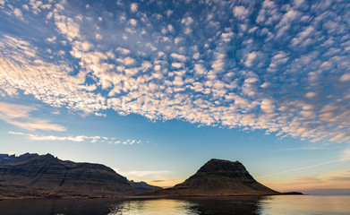 Kirkjufell Mountain as the Sun Sets from cross the bay, Iceland
