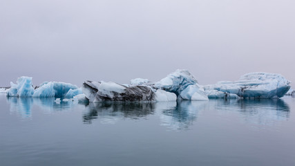 Fototapeta na wymiar Icebergs Floating on Jokulsarlon Lake, Southern Iceland