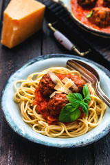 Itallian spaghetti and meatballs and parmegano for dinner, comfort food, close view