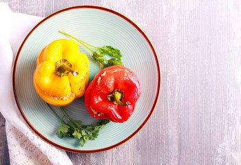 Stuffed red and yellow bell pepper