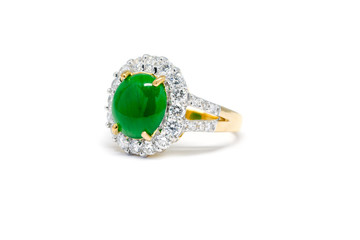 green jade with diamond and gold ring isolated © kwanchaichaiudom
