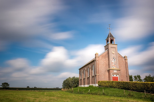 Little church on a green hill