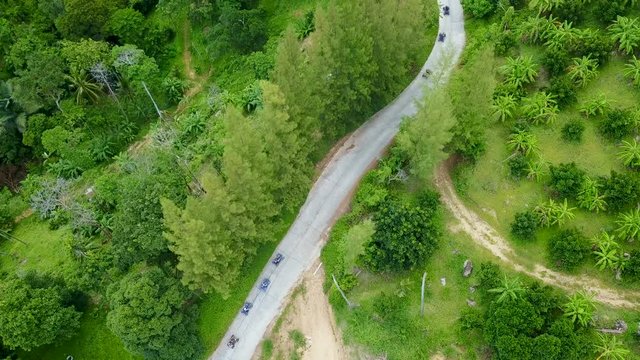 Aerial View of ATV Cars Driving in Lush Tropics