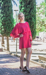 Beautiful woman in pink dress