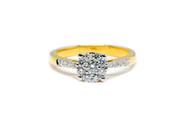 Gold ring with diamond isolated on white