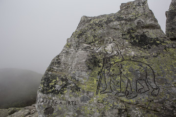 Iscrizioni rupestri valle oropa Biella Italia