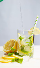 Homemade lemonade with ice in glass