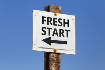 Fresh start word and arrow signpost
