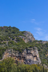 Fototapeta na wymiar Tombs of Lycian kings carved into the rocks of modern Turkey 