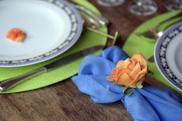 Dining table decoration with flowers and lots of color