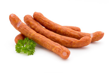 Stack of smoked sausages isolated on a white background.