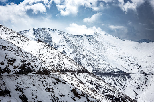 Pass on the mountain covered by snow to Nubra Valley in winter, Ladakh, Jammu and Kashmir, India.