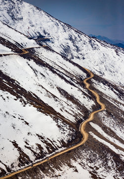 Pass on the mountain covered by snow to Nubra Valley in winter, Ladakh, Jammu and Kashmir, India.