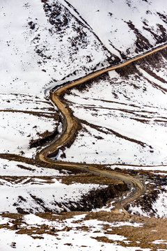 Pass on the mountain covered by snow to Nubra Valley in winter, Ladakh, Jammu and Kashmir, India.