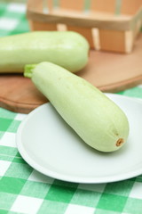 Green courgettes chopped before cooking in the home kitchen