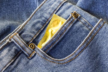 condom in blue jeans pocket