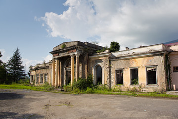 Fototapeta na wymiar Abandoned railway station in Tquarchal (Tkvarcheli), Abkhazia, Georgia
