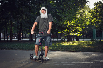 Old man on a scooter