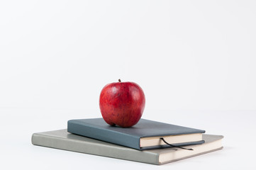 apple, books, and pencils for back to school