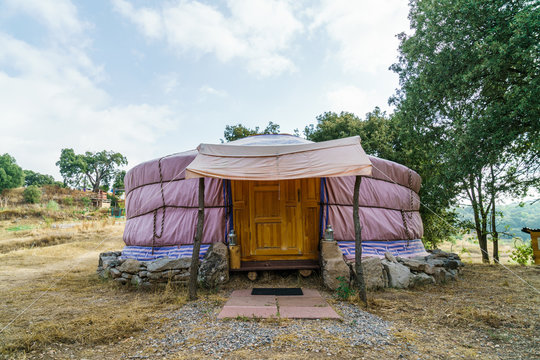 View of yurt in woods